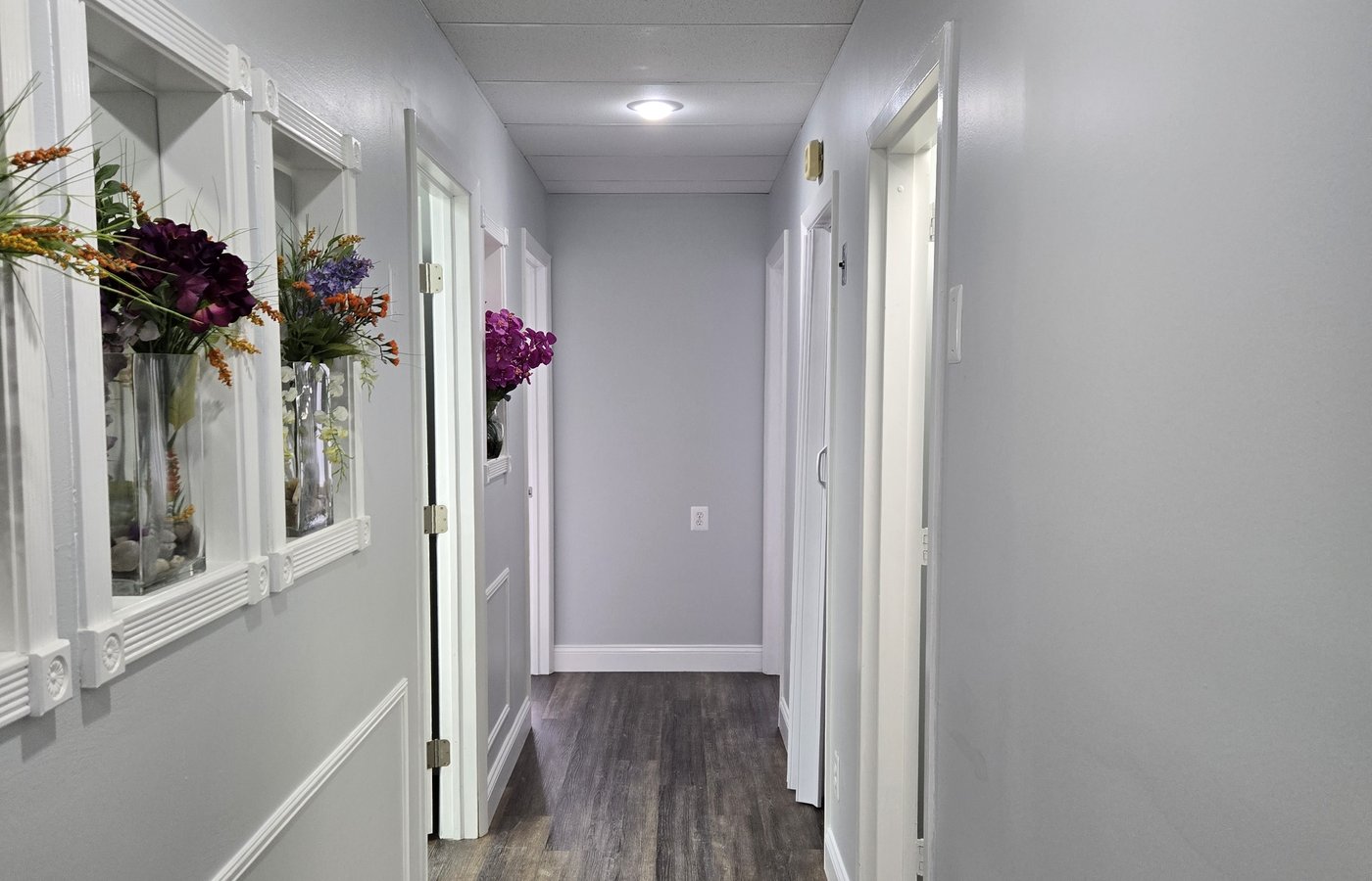 Inside Suite 303 — the hallway leading to the private treatment rooms at Cadence Acupuncture, Towson, Maryland